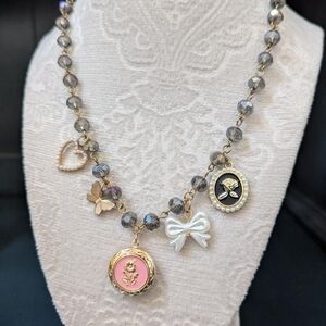 Elegant Gold and Pink Charm Necklace